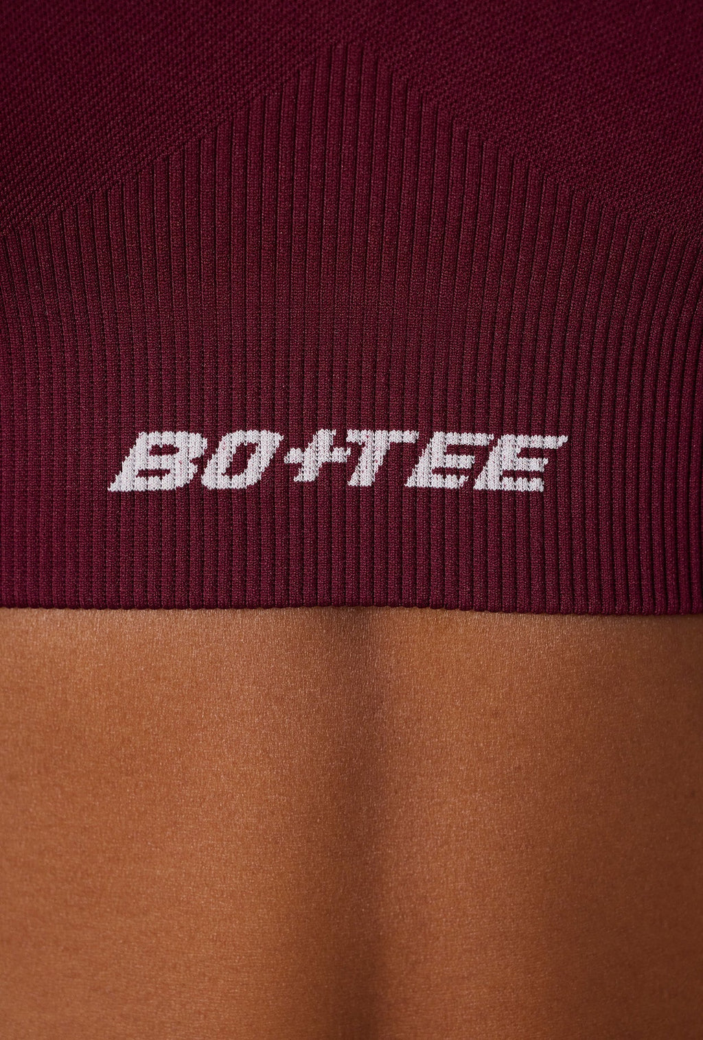 Super Sculpt Seamless Cross Back Sports Bra in Plum